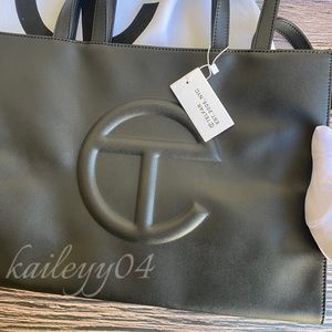 Telfar Medium black shopping bag.
